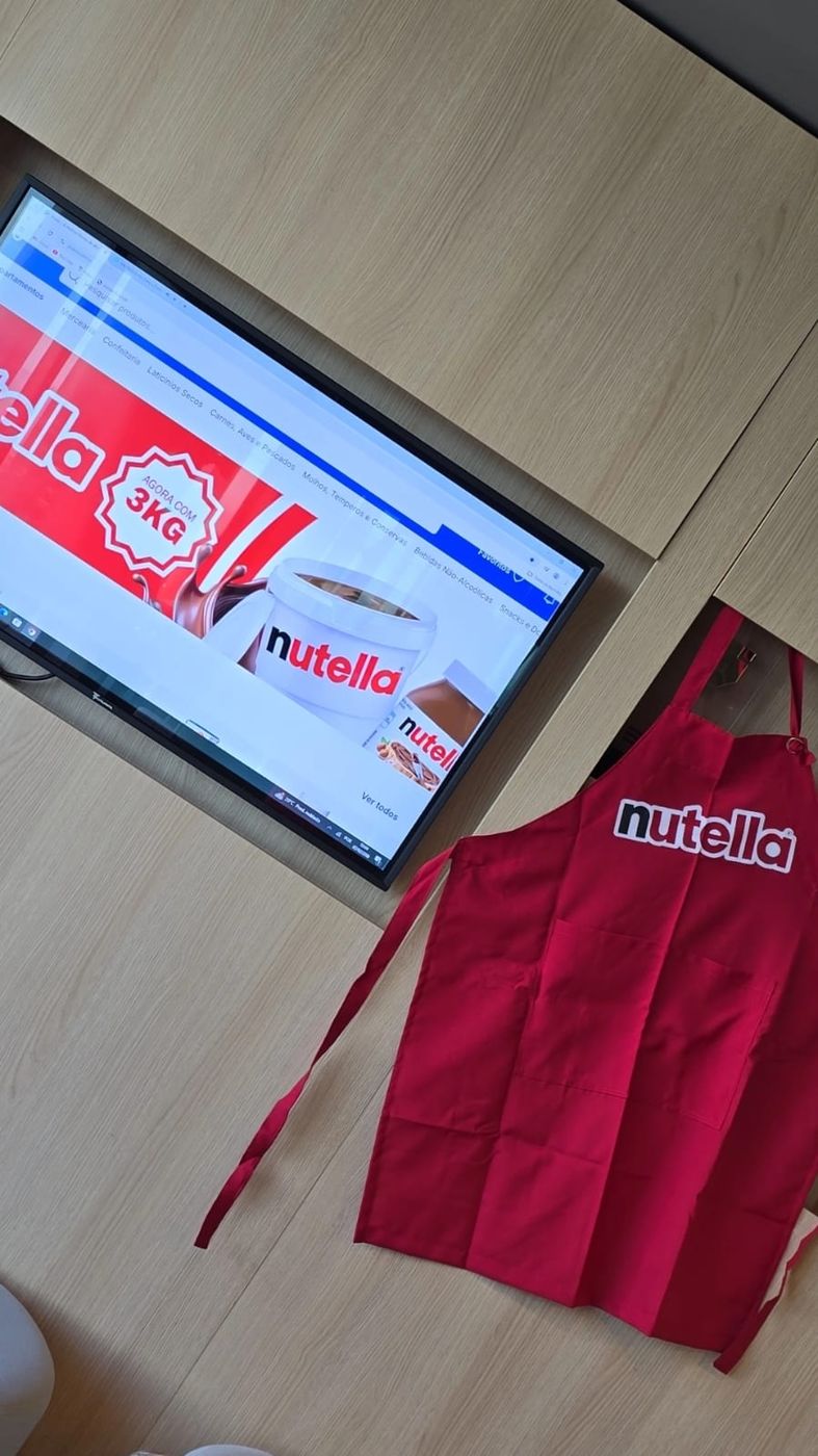Avental da Nutella e o telão com a oferta